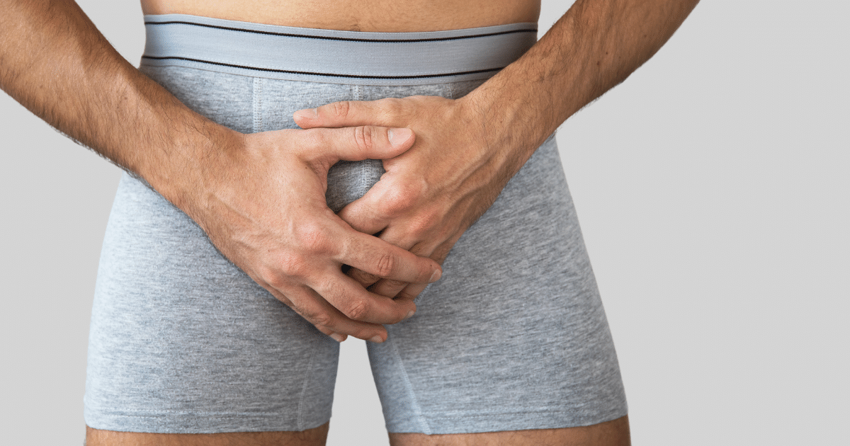 a man holding his bulges